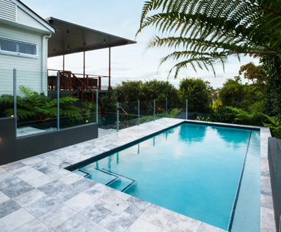 Swimming pool tile laying